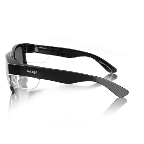 Sleek black frame safety glasses with tinted lenses for 99.95% UV protection, stylish and durable for various activities.