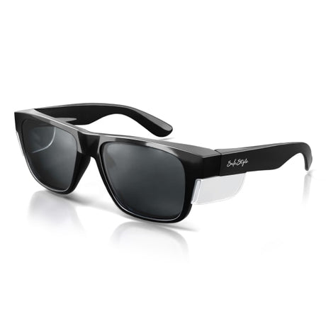 Stylish black tinted safety glasses offering 99.95% UV protection, durable polycarbonate frames for comfort and safety.