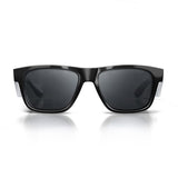 Sleek black-tinted safety glasses with UV400 protection, durable polycarbonate frame, stylish unisex design for various activities.