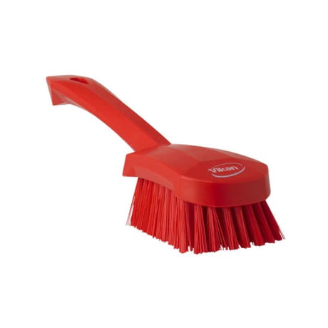 Vikan red washing brush with a short ergonomic handle and stiff bristles, ideal for heavy-duty cleaning tasks.