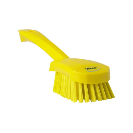 Vikan Short Handled Washing Brush in yellow with stiff bristles for effective cleaning of tough dirt on surfaces.
