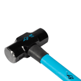 Heavy-duty OX Trade sledge hammer with 3.2kg fibreglass handle, rubber grip, and durable tempered steel head for demolition tasks.