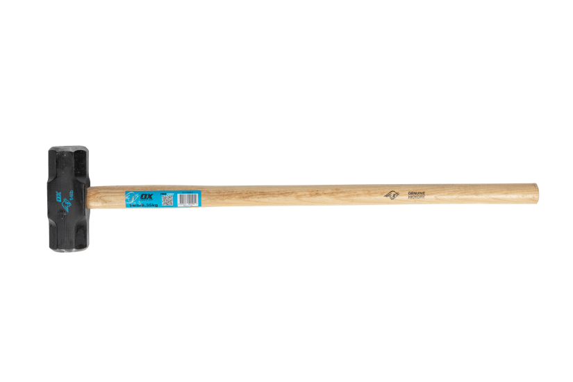 Heavy-duty OX Pro Sledge Hammer with hickory handle and hardened steel head, ideal for demolition and construction tasks.