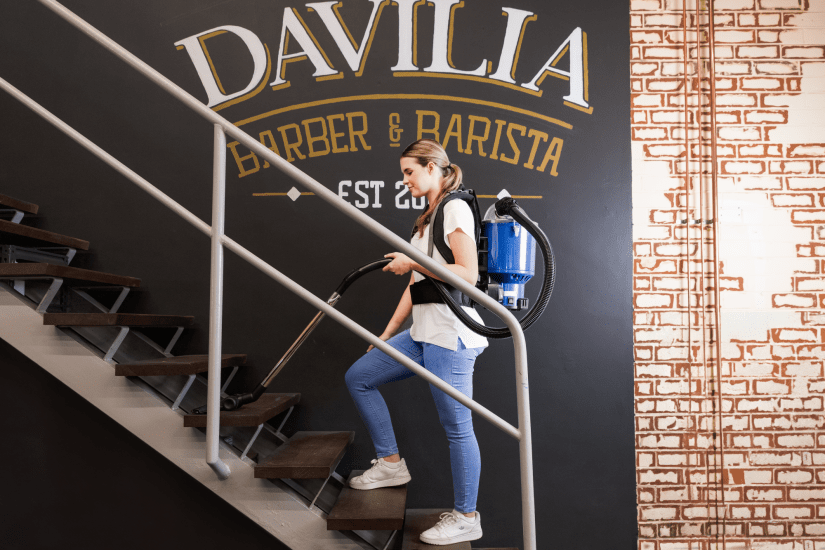 PACVAC Superpro Backpack Vacuum: lightweight, cordless, HEPA filter, Boost mode, ergonomic design, ideal for commercial cleaning.