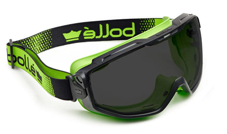 Bolle Universal Goggles with foam, featuring ergonomic design, fog-resistant coating, and a stylish green/smoke color.