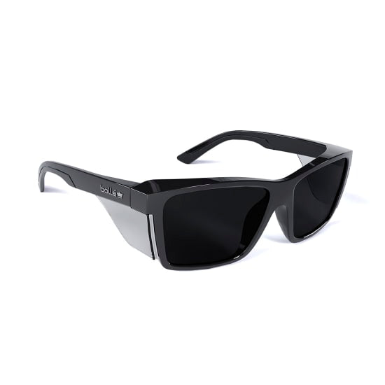 Bolle STKS 420 glasses with smoke lens and black frame, eco-friendly design with side shields for advanced eye protection.