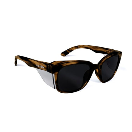 Bolle STKS 410 safety glasses feature a stylish tortoise frame, smoke lenses, and eco-friendly design for optimal eye protection.
