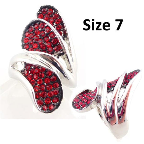 Triple teardrop ring featuring red diamante, size 7.