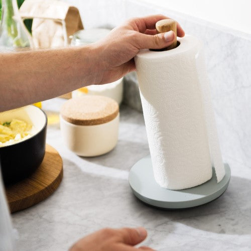 Elegant Berghoff paper towel holder with oak wood post, non-slip base, perfect for stylish kitchen organization.