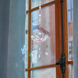 Gorgeous Crystal Suncatcher kit for tweens, includes moon gems, heart pendants, and tools for colorful light displays.