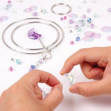 Colorful crystal suncatcher kit with moon and heart gems, perfect for creating vibrancy and good vibes in tweens' rooms.