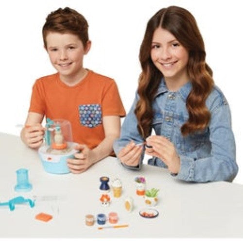 Mini Pottery Studio kit for tweens, featuring a USB pottery wheel, air-dry clay, and tools for easy mini creations.