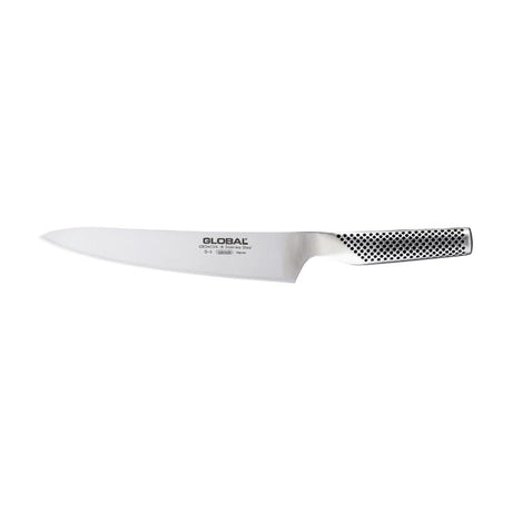 Global Classic 21cm Carving Knife, featuring a razor-sharp stainless steel blade for precise slicing of meats and fish.