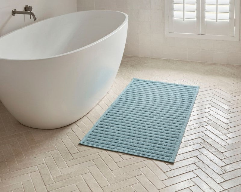 Luxurious Baltic green double bath mat by BAKSANA, 100% cotton, featuring a stylish striped texture, 60 x 120cm.