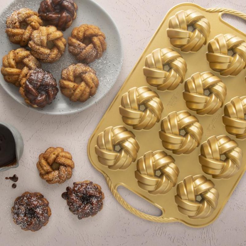 Elegant Nordic Ware Mini Bundt® Pan featuring a braided design, perfect for individual cakes and treats.