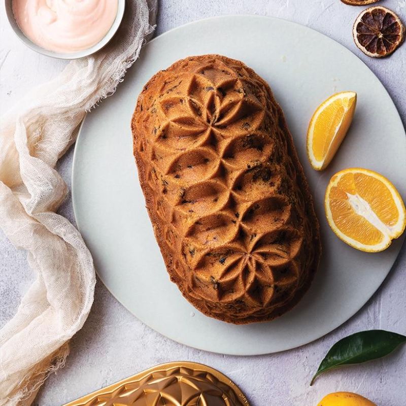 Nordic Ware Jubilee Loaf Pan with elegant pocketed patterns, 6-cup capacity, and durable nonstick finish for easy baking.