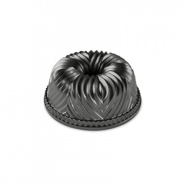 Cast aluminum Bundt pan with geometric designs, 10-cup capacity, nonstick interior for easy release and cleanup.