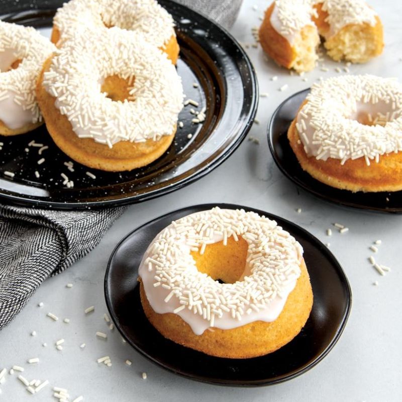 Nordic Ware Classic Full Donut Pan with a vibrant finish, bakes 6 non-fried, perfectly shaped donuts; durable and nonstick.