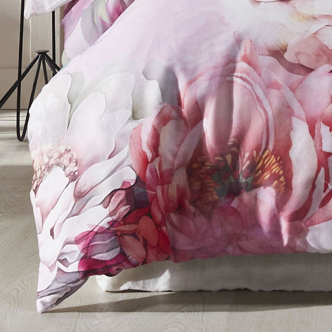 Pink floral duvet cover set with soft geo reverse, crafted from 100% cotton sateen for a luxurious feel and effortless elegance.