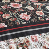 Super King Duvet Cover Set featuring a black floral design with cherry blossoms, includes matching pillowcases for a serene bedroom.