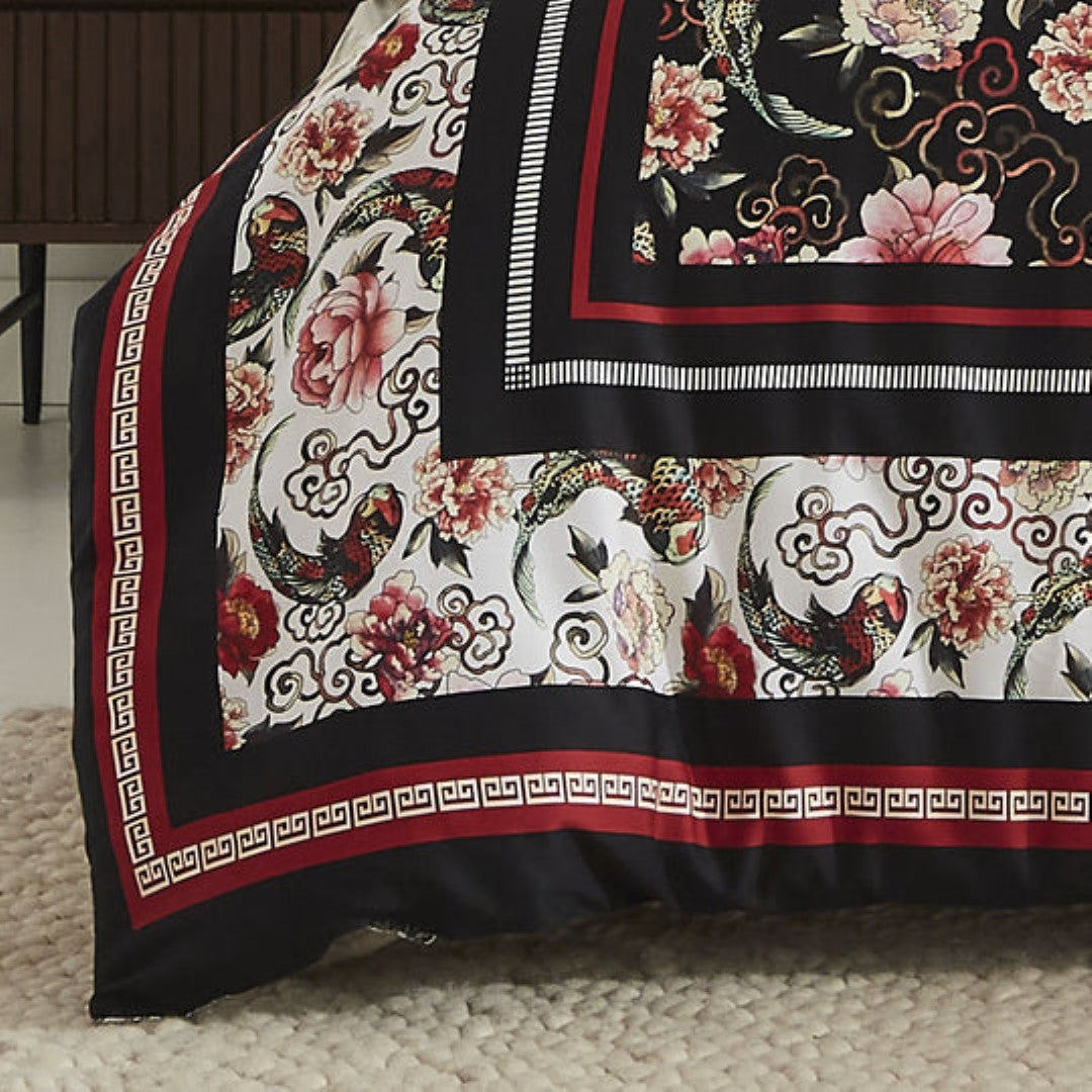 Super King Duvet Cover Set featuring an oriental floral design with cherry blossoms on a black, red, and white background.