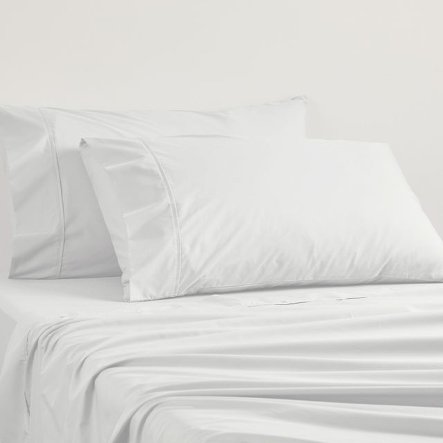 Logan and Mason 250TC Silver sheet set featuring cotton-poly blend, percale weave, 50cm deep walls, and elegant piping details.