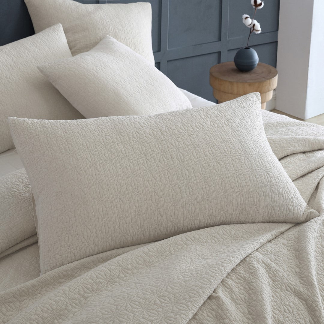 Modern Kayo Linen Pillowsham Pair featuring geometric embroidery in stone and charcoal, 100% cotton for a stylish, textured look.