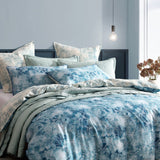 Logan and Mason Kiama Blue Queen Duvet Cover Set featuring serene coastal floral watercolor design in teal hues, 100% cotton sateen.