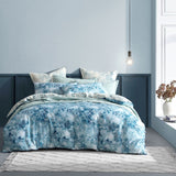 Logan and Mason Kiama Blue Queen Duvet Cover Set featuring coastal floral designs in teal shades on soft 100% cotton sateen.