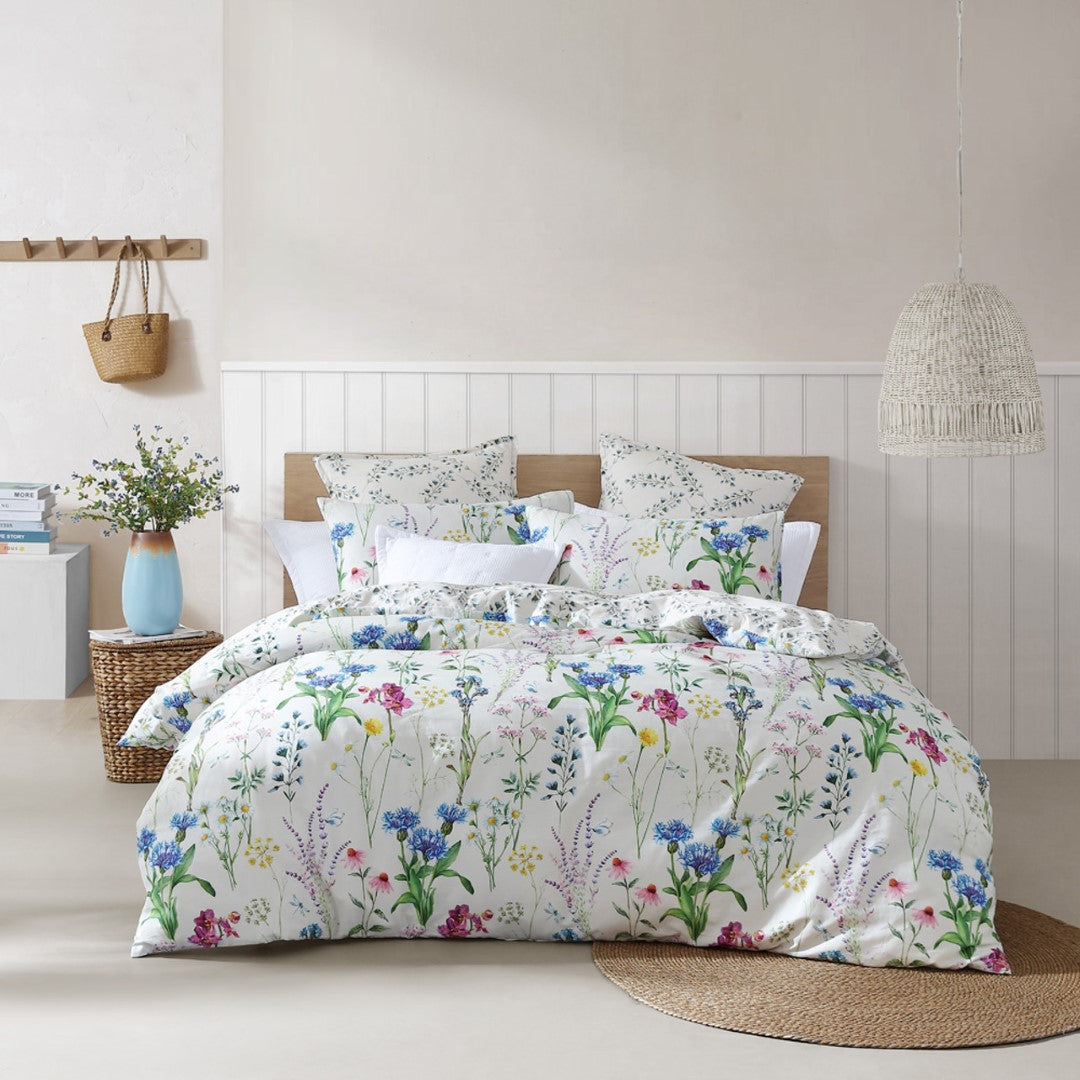 Logan and Mason Floriana Ivory duvet cover set featuring vibrant floral design on ivory cotton sateen for a serene bedroom retreat.