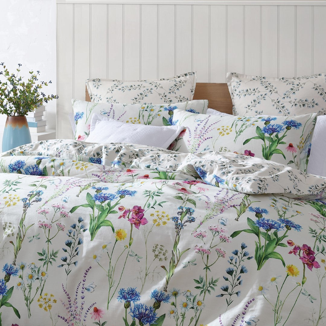 Queen duvet cover set in ivory with elegant floral design, perfect for a serene and sophisticated bedroom retreat.