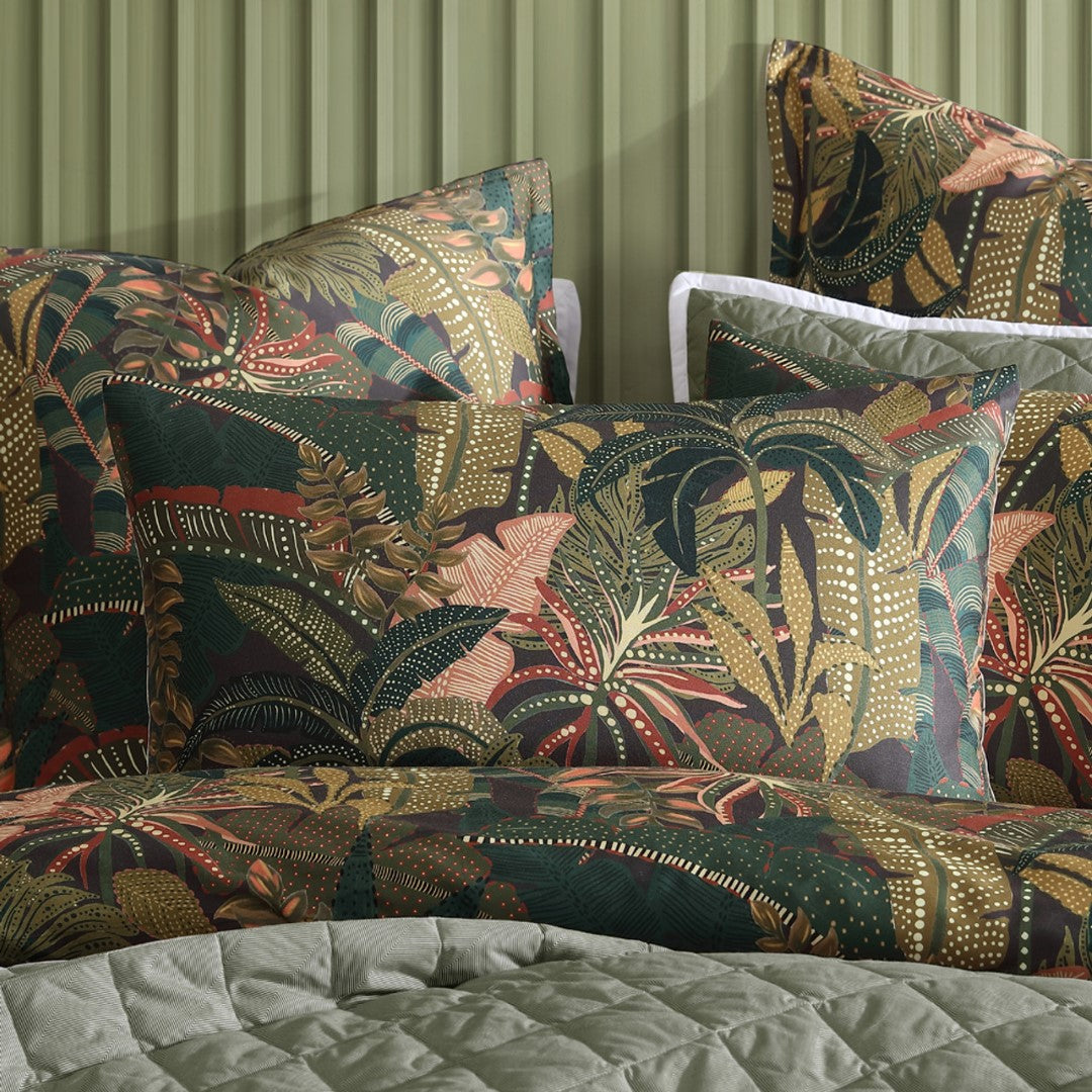 King Duvet Cover Set in Zawadi Green features vibrant foliage on charcoal, crafted in 100% cotton sateen for a tropical aesthetic.