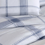 Super King Duvet Cover Set in Cannon White featuring a subtle check pattern, self-flanged edges, and elegant white piping.