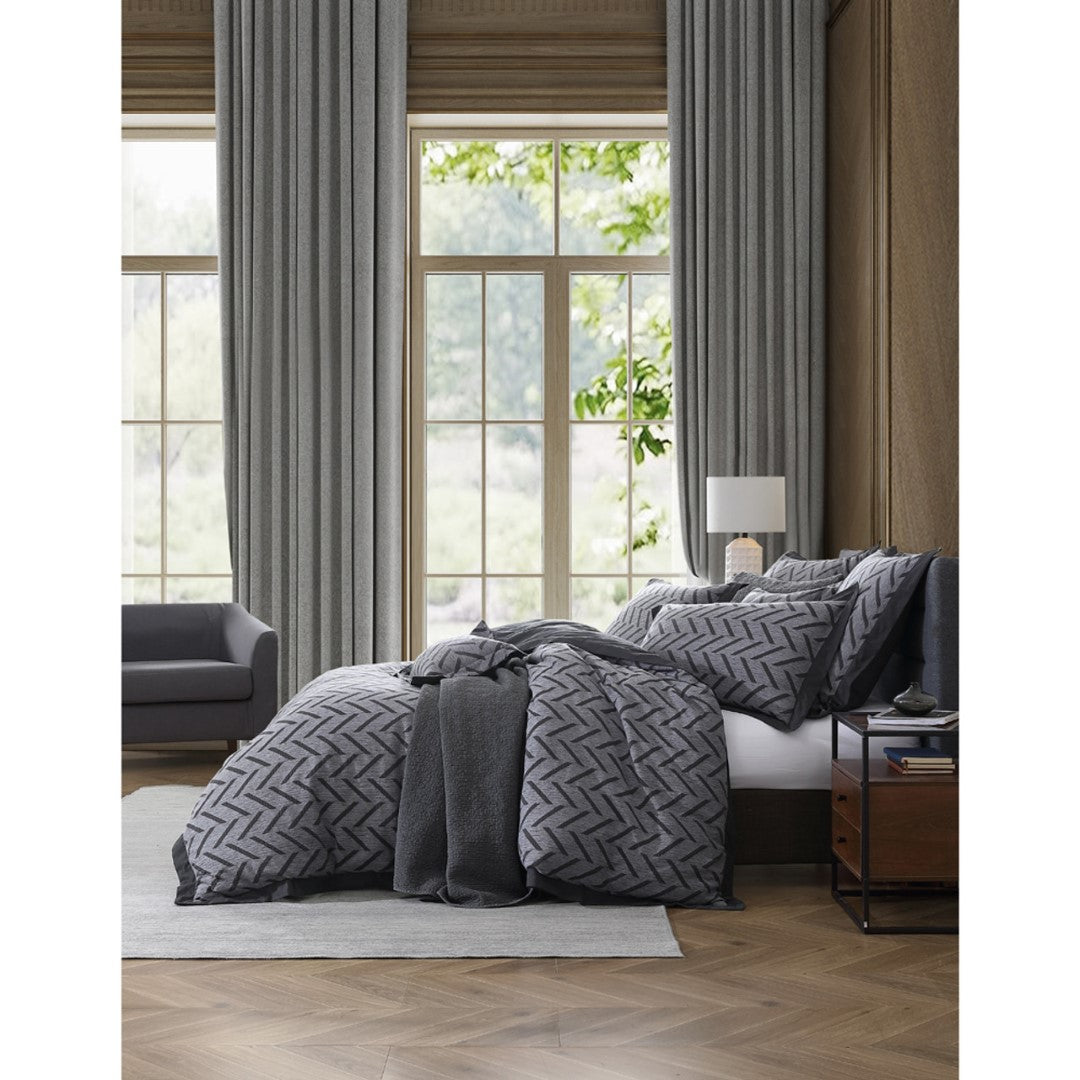 Queen duvet cover set in charcoal featuring a herringbone pattern, made from 100% cotton for a soft, elegant bedding look.