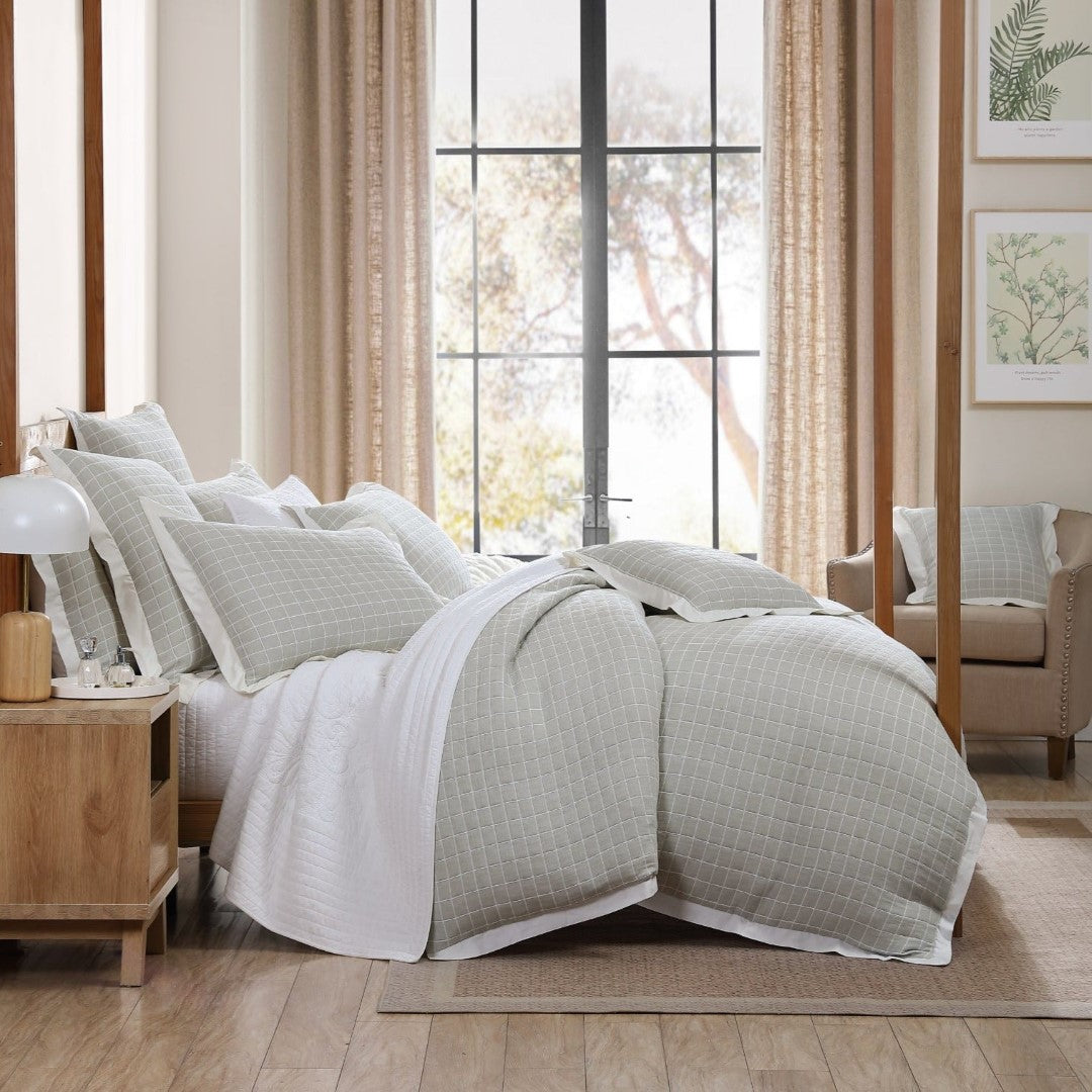 King Duvet Cover Set in elegant check pattern with tailored flange, crafted from 100% cotton for comfort and style.