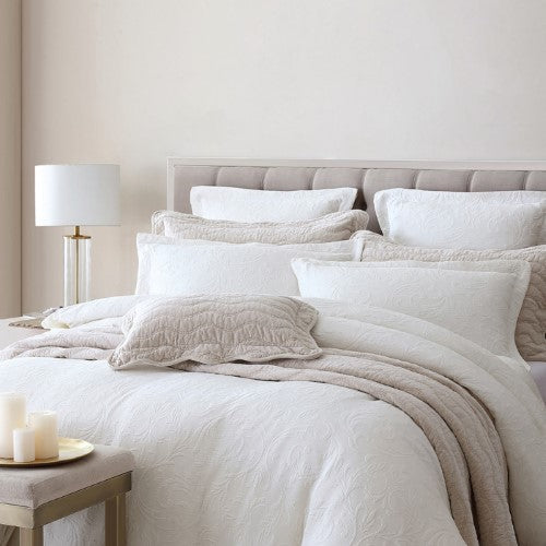 Elegant Marbella Ivory Queen Duvet Cover Set featuring modern damask design and luxurious 100% cotton matelassé fabric.