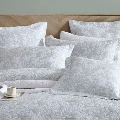 Elegant Quinn Sage European pillowcase featuring Australian foliage-inspired design, soft sage tones, and pompom lace trim.