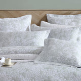 Elegant Quinn Sage European pillowcase featuring Australian foliage-inspired design, soft sage tones, and pompom lace trim.