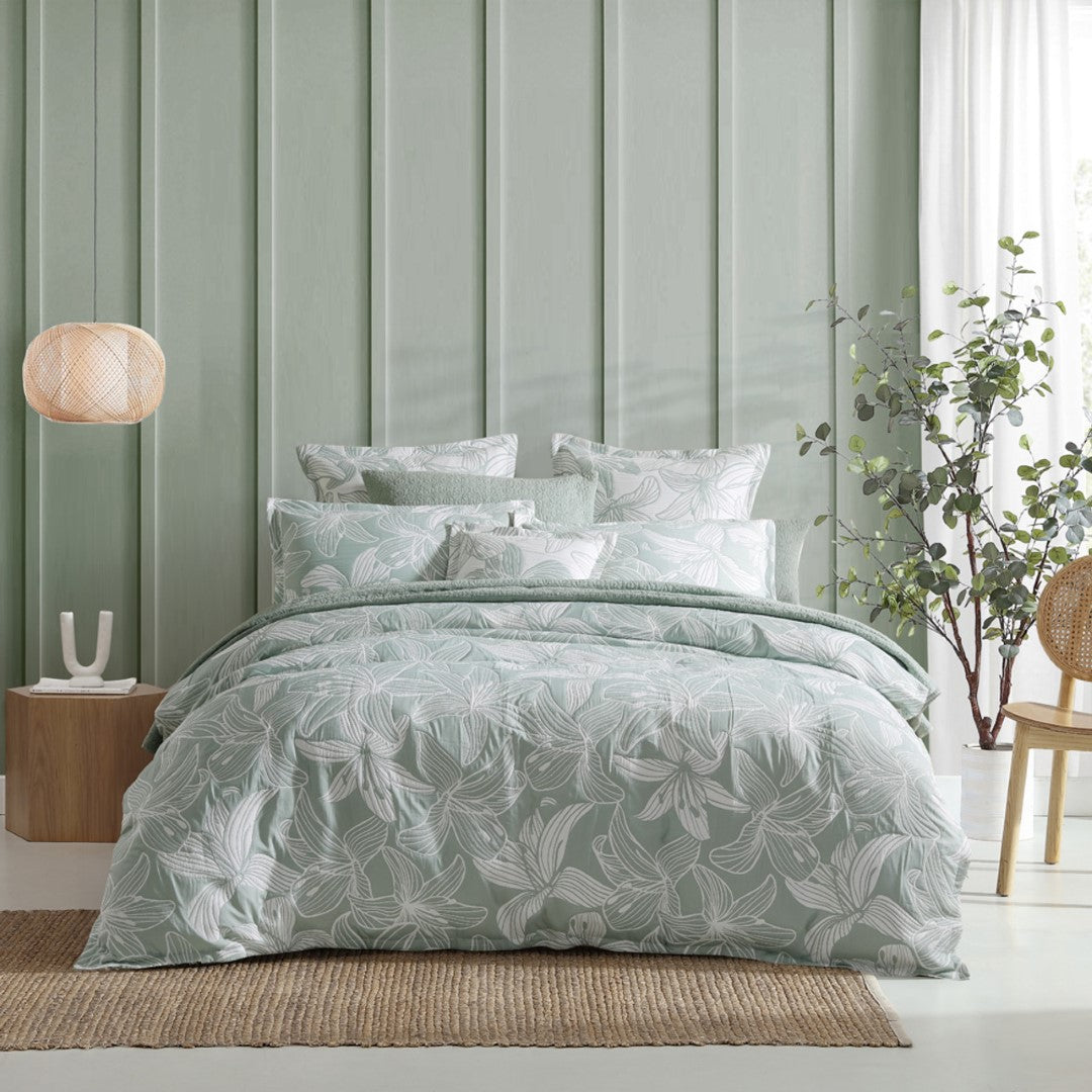 King duvet cover set in Platinum Grace Sage featuring a stylized hibiscus pattern on a white backdrop, made from cotton-polyester blend.