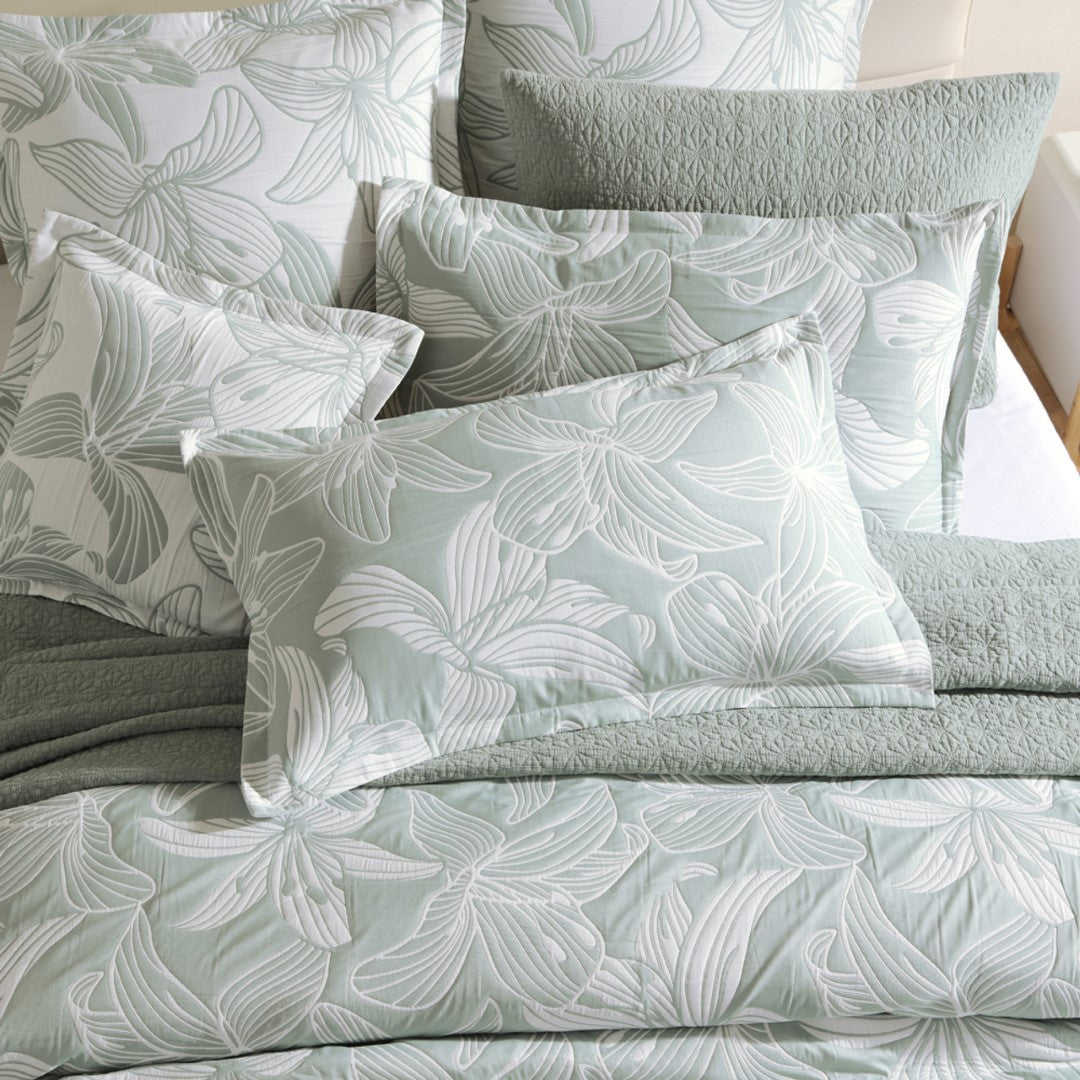 King Duvet Cover Set in Platinum Grace Sage featuring stylized hibiscus flowers on a white backdrop, crafted from a luxurious fabric blend.