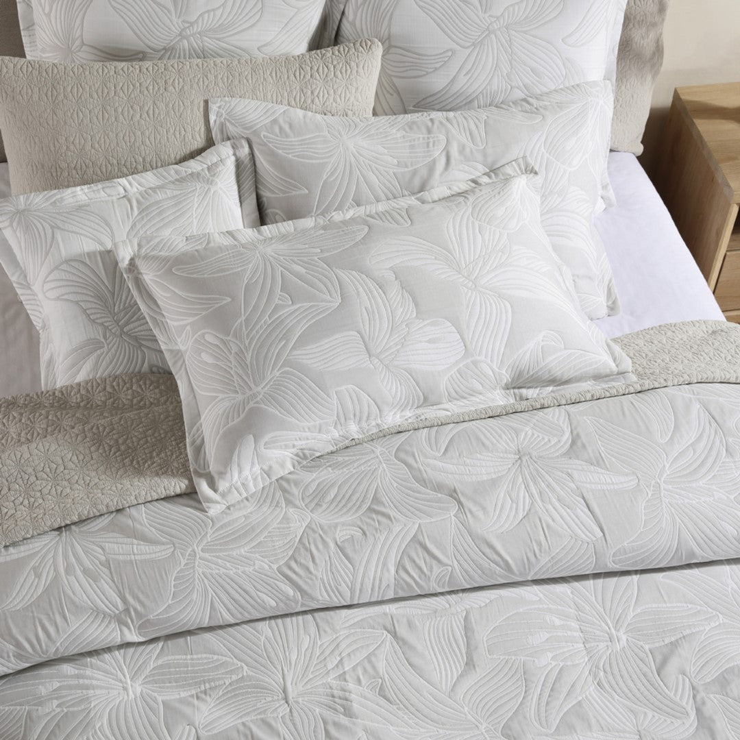 Platinum Grace Dove King Duvet Cover Set featuring stylized hibiscus flowers in soft colors, adding elegance to your bedroom.