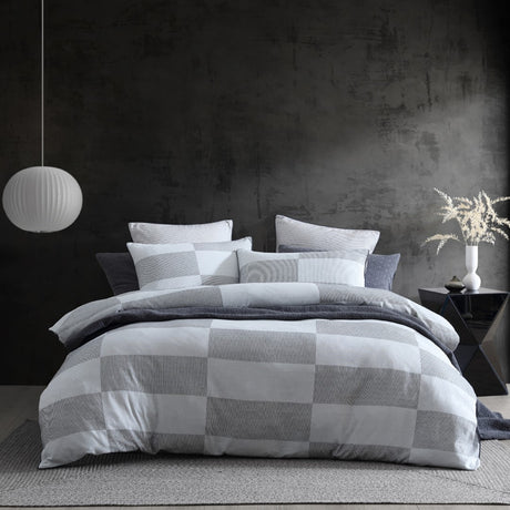 Queen duvet cover set in Region Grey with geometric design, crafted from soft cotton jacquard for elegant bedroom decor.