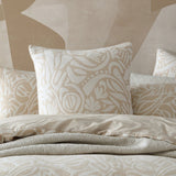 King Duvet Cover Set in rich caramel tones with hand-drawn motifs, blending luxury cotton and polyester for a cozy elegance.