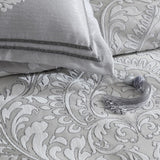 Queen Duvet Cover Set in silver and ivory, featuring jacquard damask design and double grosgrain tape detail.