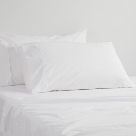 Standard white pillowcase made of 250TC poly/cotton percale, offering comfort and durability with a clean aesthetic.