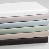 Queen bed sheet set in sage green, featuring soft 250TC poly/cotton percale, includes flat sheet, fitted sheet, and pillowcases.