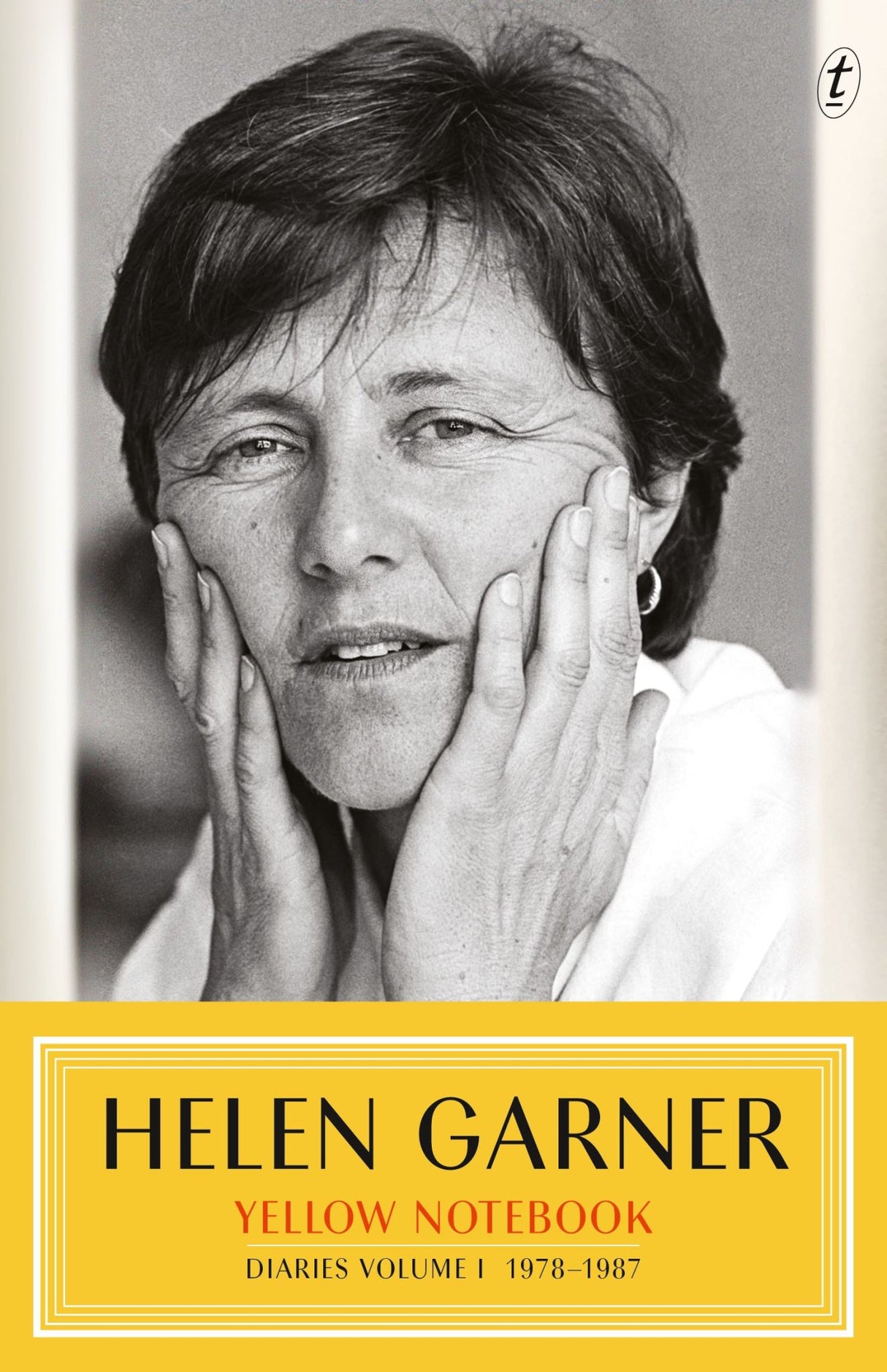 Close-up of the *Yellow Notebook: Diaries Volume I*, featuring candid insights and reflections from author Helen Garner.