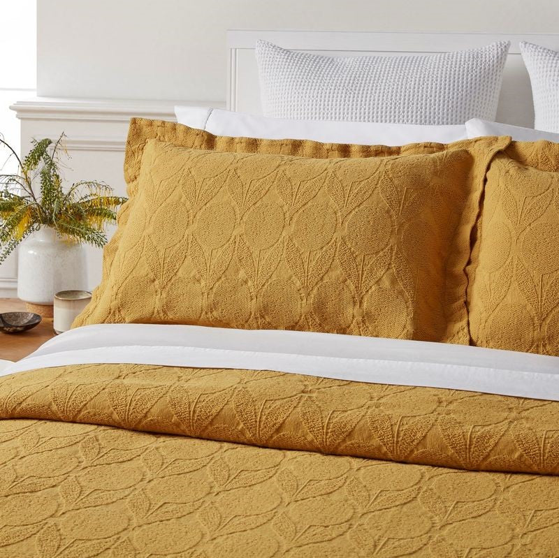 CITRON Saffron King Bedspread by BAKSANA featuring a floral design, ethically made in Portugal with Oxford pillowcases included.