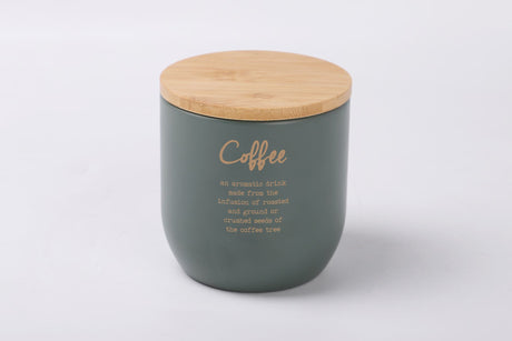 Stylish gray-green metal coffee tin with gold lettering, bamboo lid, and airtight seal for fresh coffee storage.