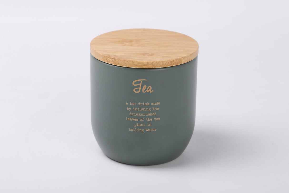 Rockingham Metal Tea Tin in gray and green with gold accents, features bamboo lid and rubber seal for freshness.